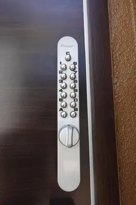 a remote control on the door of a room at 72, Nakanobu A, Entire house for rent, \u4e2d\u5ef6A in Tokyo