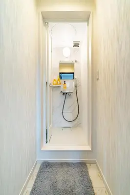 a bathroom with a shower with a window at 83, Higashi-Yotsugi 3, Entire house for rent in Tokyo