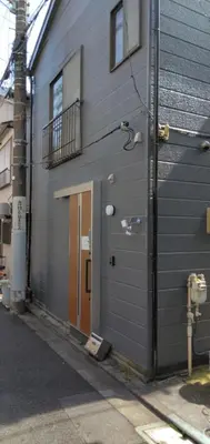 a building with a door on the side of it at 96, Tateishi A, Entire house for rent, \u7acb\u77f3A in Tokyo