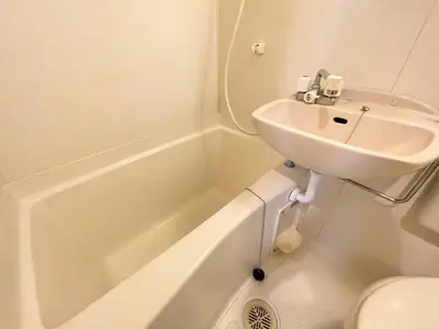 a bathroom with a sink and a toilet and a tub at \u30b7\u30e3\u30f3\u30c6\u9ad8\u7530\u99ac\u583422 in Tokyo