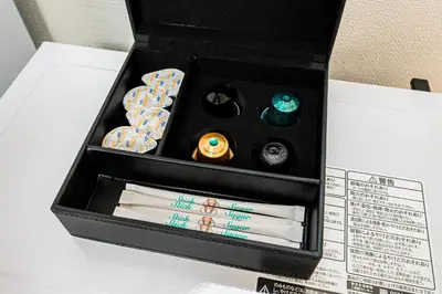 a box with a bunch of donuts in it at KYARA Hotel\u30df\u30b9\u30df202 in Tokyo