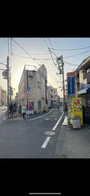 an empty city street with buildings on the side at \u6771\u4eac\u306e\u6e2f\u7063-Tokyo Harbor -28 square meter king size garden room103 in Tokyo