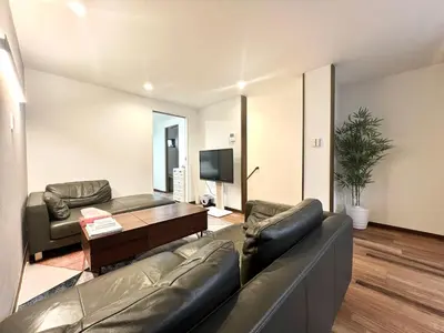 a living room with a couch and a table at Kenki Asakusa House-TT0171 in Tokyo