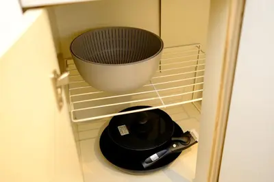 a toilet in a cabinet with a bucket on it at \u30e9\u30f3\u30c9\u30d5\u30a9\u30ec\u30b9\u30c8\u4e21\u56fd - \u6d45\u8349\u3084\u30b9\u30ab\u30a4\u30c4\u30ea\u30fc\u8fd1\u304f- \u6700\u59276\u540d\u5bbf\u6cca\u53ef in Tokyo