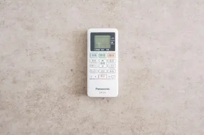a remote control sitting on top of a table at K-room in Tokyo