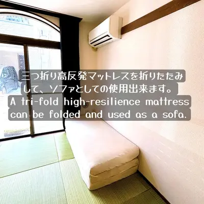 a hotel room with a bed in a room at \u30af\u30aa\u30ea\u30c6\u30a3\u30cf\u30a4\u30c4\u6c60\u888b\u99c5\u897f\u53e3\u81f3\u8fd1 in Tokyo