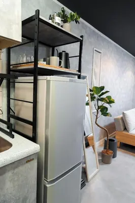 a kitchen with a refrigerator and a shelf at Pet-Friendly, Projector, 2LDK, 6pp, Shinagawa Area in Tokyo