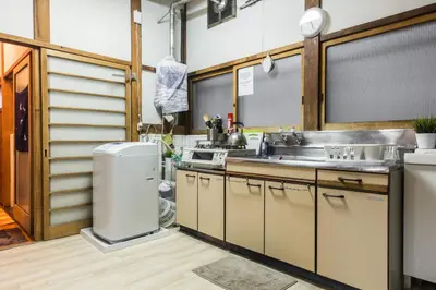 a kitchen with a sink and a refrigerator at Samurai House - Vacation STAY 54179v in Tokyo