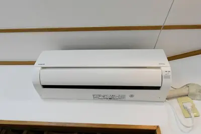a white printer sitting on top of a counter at Largo in Tokyo