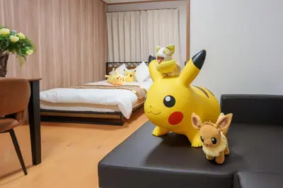 a pikachu toy on a table in a bedroom at Room 201 - Itabashi Minamicho - Diamond Yu in Tokyo
