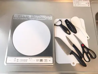 a box with a mirror and a bunch of knives at Shibuya Wave 101 in Tokyo