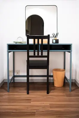 a black desk with a chair and a mirror at Central Shinjuku apartment with beautiful city view 3stops to Shibuya in Tokyo