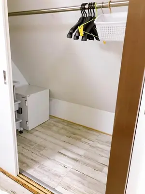 an empty room with a floor and a closet at SKY BLUE HOUSE Asakusabashi in Tokyo