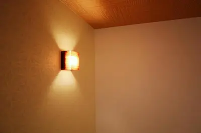 a light on a wall in a room at \u5c3e\u4e45\u65b0\u7bc9 in Tokyo