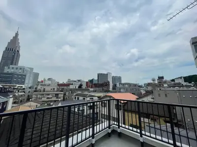 a view of a city from a balcony at ShibuyaYoyogi Shinjuku 8psn 70sqm New Apartment Maisonette in Tokyo
