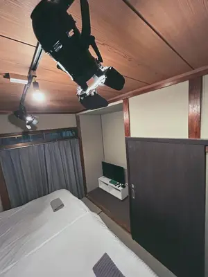 a person is jumping off of a bed in a room at 5min to Station, Best Value 3BR Sleeps 8, Quiet Area in Tokyo