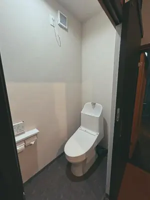 a bathroom with a white toilet in a room at 5min to Station, Best Value 3BR Sleeps 8, Quiet Area in Tokyo