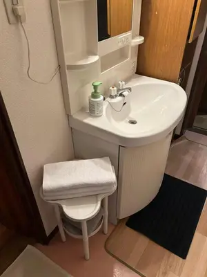 a small bathroom with a sink and a toilet at JOY HOUSE Near Ikebukuro in Tokyo