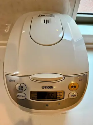 a white computer mouse sitting on top of a table at Brand New Modern Haven 7-Min Walk to Shinkoenji Station 9-Min Train to Shinjuku in Tokyo