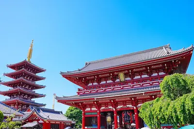 a large red building with a large tower at Bohemian Tokyo in Tokyo