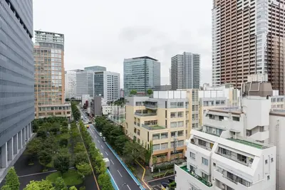 an aerial view of a city with tall buildings at Village Gotanda in Tokyo