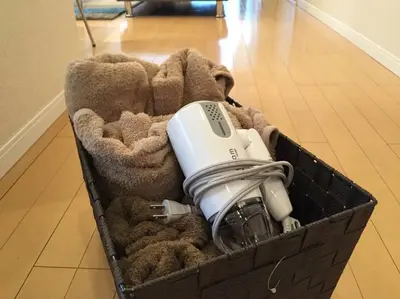 a hair dryer in a box on the floor at Village Gotanda in Tokyo