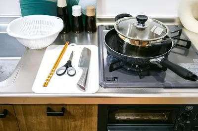 a pot on top of a stove in a kitchen at Maru 5 Inn in Tokyo