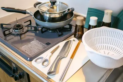 a kitchen counter with a pot on a stove at Maru 5 Inn in Tokyo