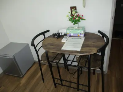 a small table with a gift and a box on it at \u30e9\u30a4\u30aa\u30f3\u30ba\u30de\u30f3\u30b7\u30e7\u30f3\u9053\u7384\u5742a in Tokyo