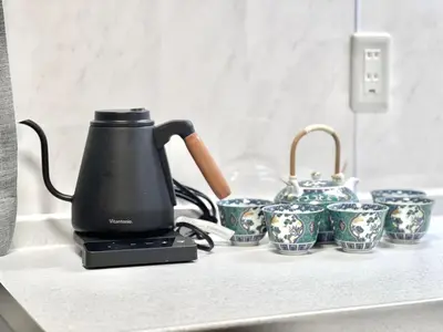 a coffee pot sitting on a counter next to cups at Hyakuninchō house NEW OPEN-SJ0067 in Tokyo