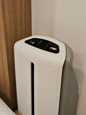 a white toaster sitting next to a wall at Asakusa Stay in Tokyo