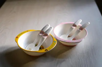 two bowls with utensils in them sitting on a table at TD Stay Tokyo in Tokyo