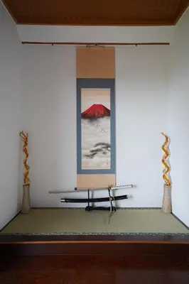 a room with a stage with a painting on the wall at Hotel Iemirai Nakano Penthouse - SHINJUKU 12min train ride in Tokyo
