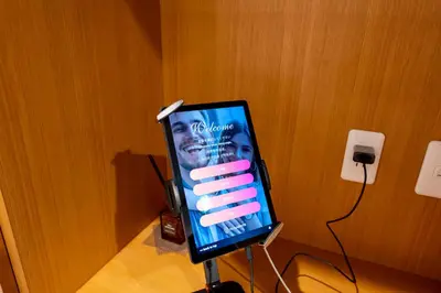 a tablet computer on a stand in a room at Hotel Iemirai Nakano Penthouse - SHINJUKU 12min train ride in Tokyo