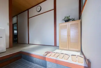 a room with three pairs of shoes sitting on a porch at New Super Deals Now Available Direct Access to Akihabara Shinjuku and Disneyland in Tokyo