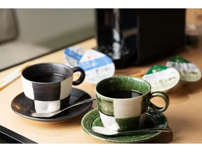 two coffee cups and saucers sitting on a counter at Prostyle Ryokan Tokyo Asakusa - Vacation STAY 48261v in Tokyo