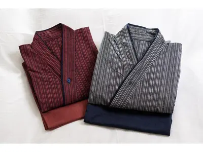 two different colored ties sitting on a bed at Prostyle Ryokan Tokyo Asakusa - Vacation STAY 48261v in Tokyo