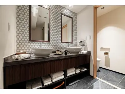 a bathroom with two sinks and a mirror at Prostyle Ryokan Tokyo Asakusa - Vacation STAY 48262v in Tokyo