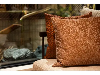 a brown pillow sitting on top of a couch at Prostyle Ryokan Tokyo Asakusa - Vacation STAY 48265v in Tokyo