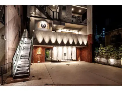 an empty lobby of a building with a staircase at Prostyle Ryokan Tokyo Asakusa - Vacation STAY 48265v in Tokyo