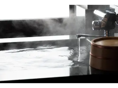 a sink with water coming out of a faucet at Prostyle Ryokan Tokyo Asakusa - Vacation STAY 48266v in Tokyo