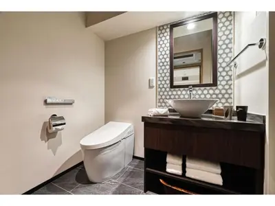 a bathroom with a white toilet and a sink at Prostyle Ryokan Tokyo Asakusa - Vacation STAY 48266v in Tokyo