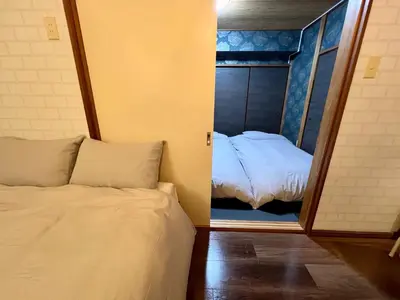 a small room with a bed and a mirror at Vista Ikegami 202 - Vacation STAY 17403 in Tokyo