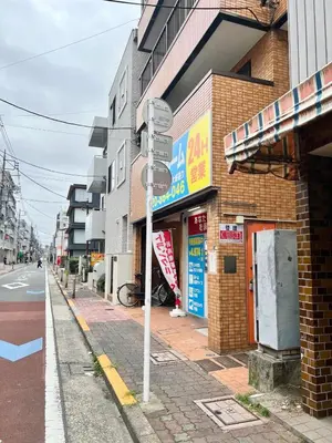 a street sign on the side of a street at Vista Ikegami 202 - Vacation STAY 17403 in Tokyo