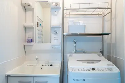 a small kitchen with a sink and a sink at Asakusa Stay in Tokyo