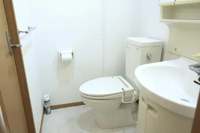 a white bathroom with a toilet and a sink at Swan Lake Inn Shinjuku Room 501 - Vacation STAY 16588 in Tokyo