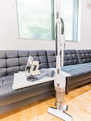 a hospital room with a mri machine next to a couch at BH Terace 102 - Vacation STAY 17368 in Tokyo
