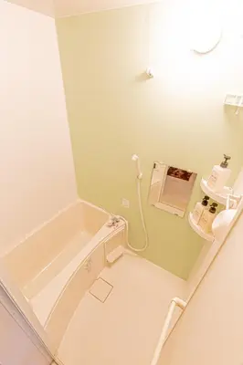 a bathroom with a bath tub and a mirror at A to - Vacation STAY 17369 in Tokyo
