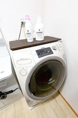 a washing machine with two bottles on top of it at A to - Vacation STAY 17369 in Tokyo