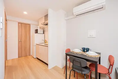 a kitchen and dining room with a table and chairs at japan house T-Plaza sugamo in Tokyo